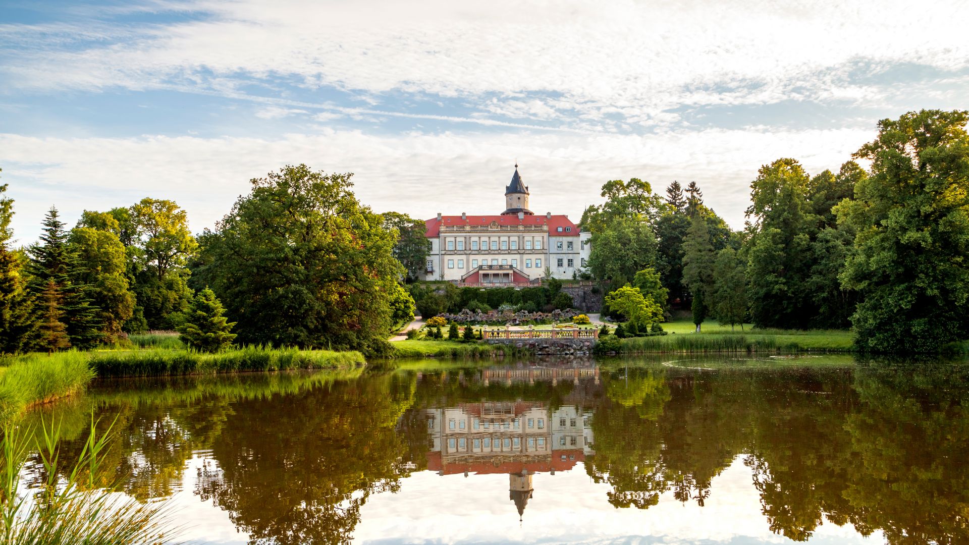 Wiesenburg/Mark: castle with reflection in lake