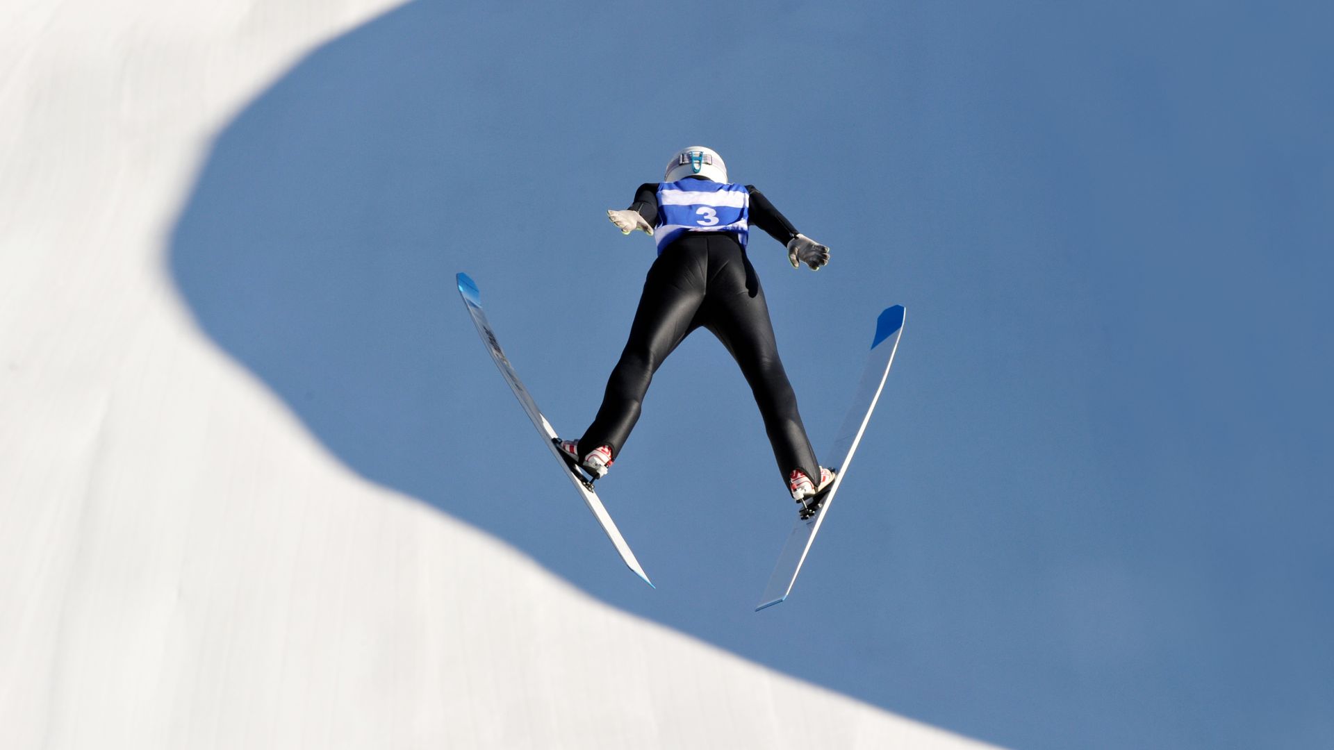 Ski jumper in flight