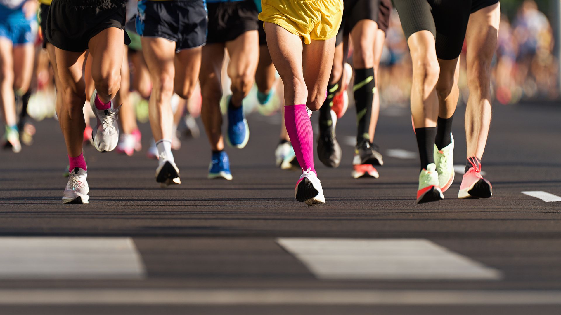 Close-up of legs on a marathon run